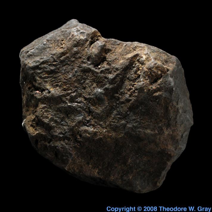 Heavy lump of master alloy, a sample of the element Manganese in the